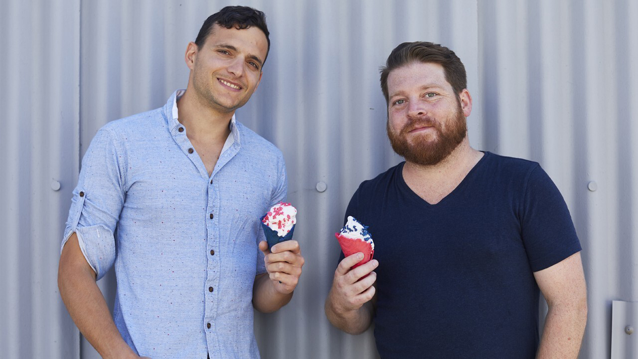 Aylon Steinhart on the left and Thomas Bowman on the right, each holding an ice cream cone.