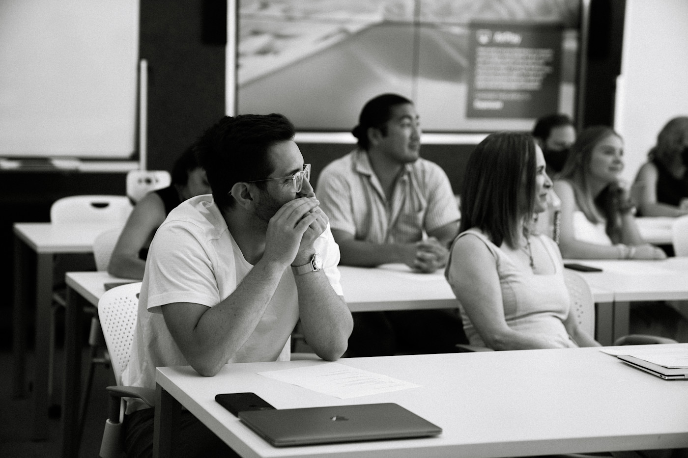 People listening during a session in Ayzenberg’s careers-gallery photograph