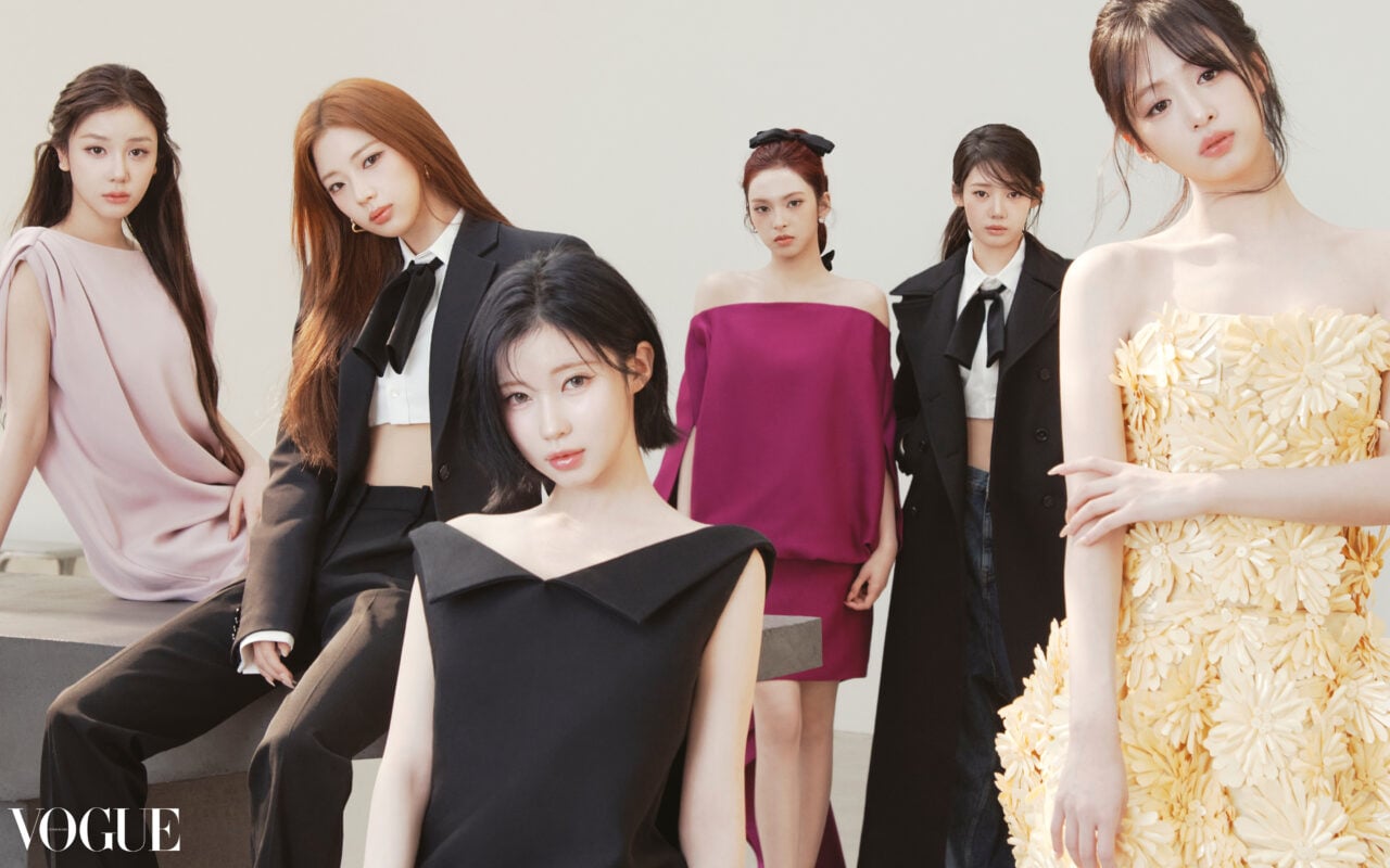 BABYMONSTER members in tailored fashion for a 2026 group portrait