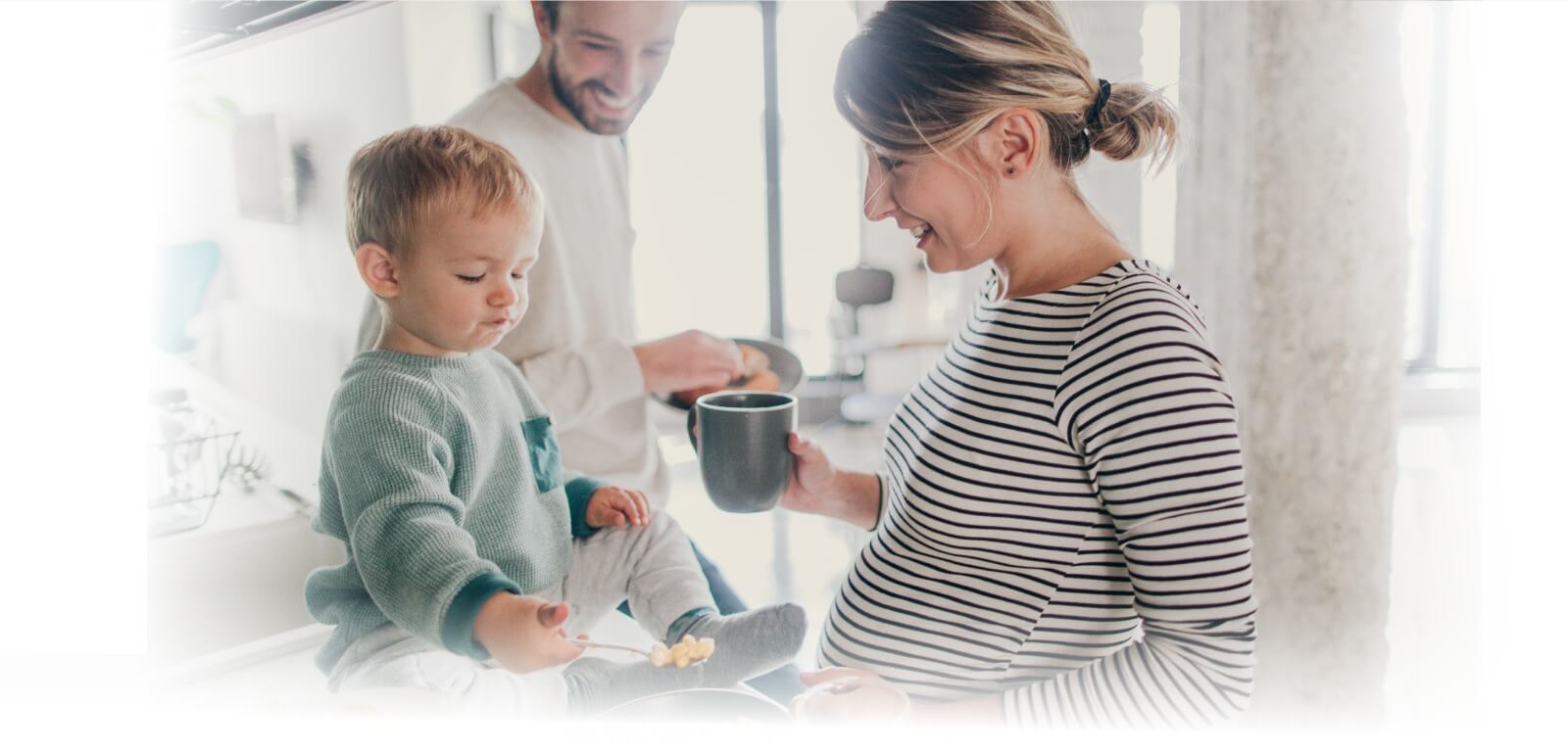 A parent and young child using BabySparks together at home