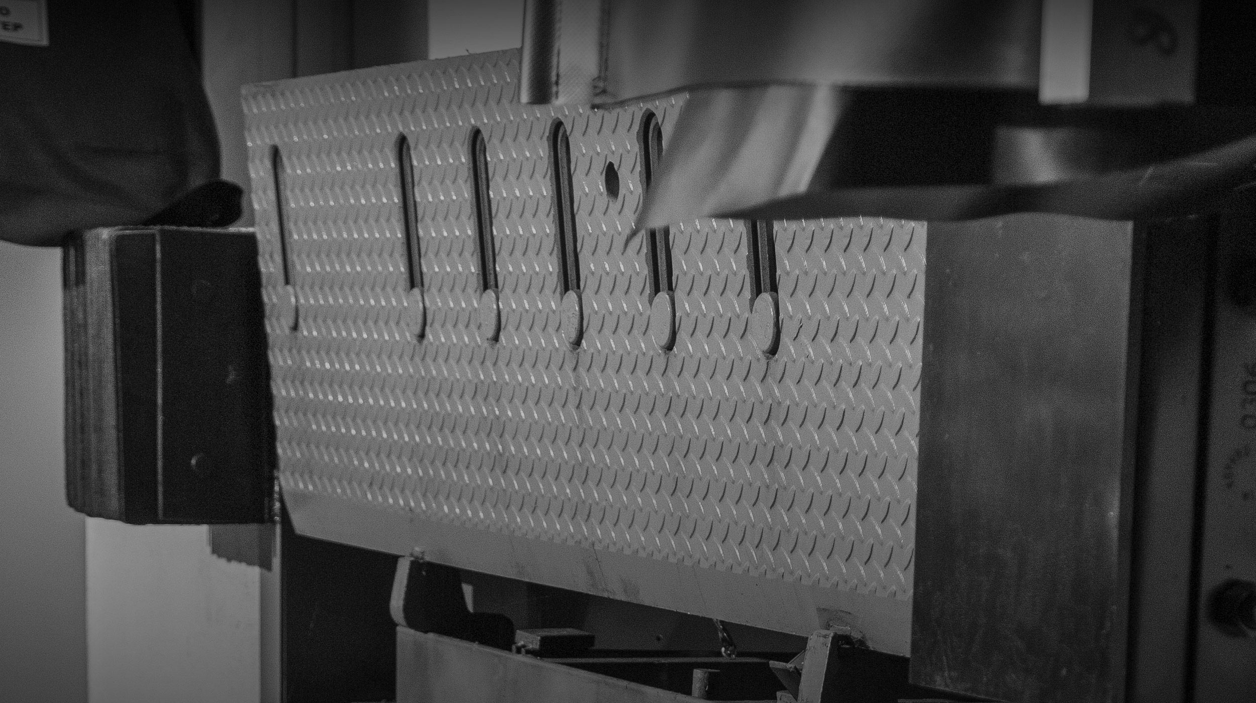 A close view of industrial loading dock equipment from Backe's Stokes Equipment work
