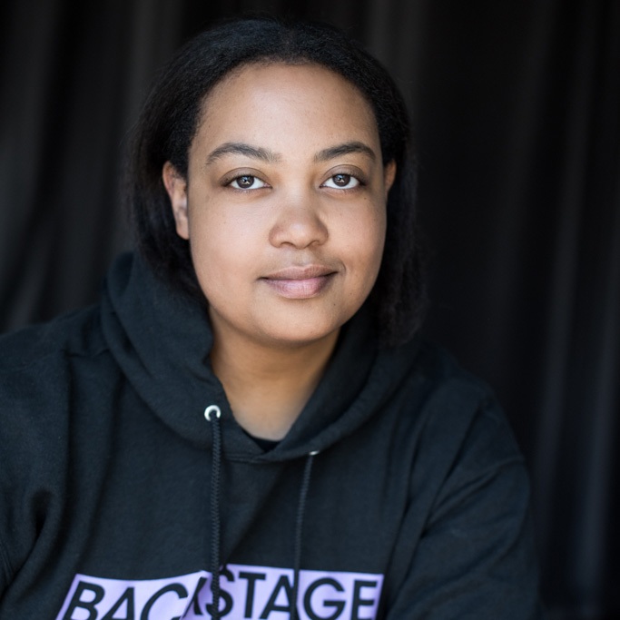 Arlan Hamilton wearing a Backstage sweatshirt