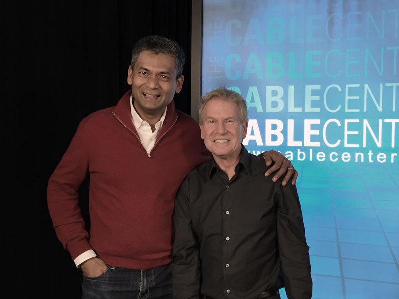 Balan Nair and interviewer Stewart Schley standing together at The Cable Center