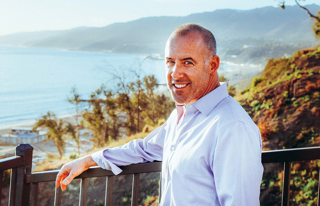 Bambino founder Sean Greene standing by a coastal overlook in Pacific Palisades