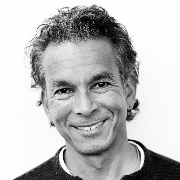 Black-and-white portrait of founder and principal Steve Barretto