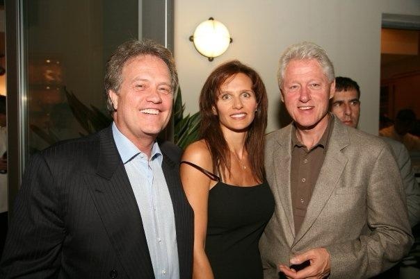 Barry Ellsworth, at left, posing with two other people at an event