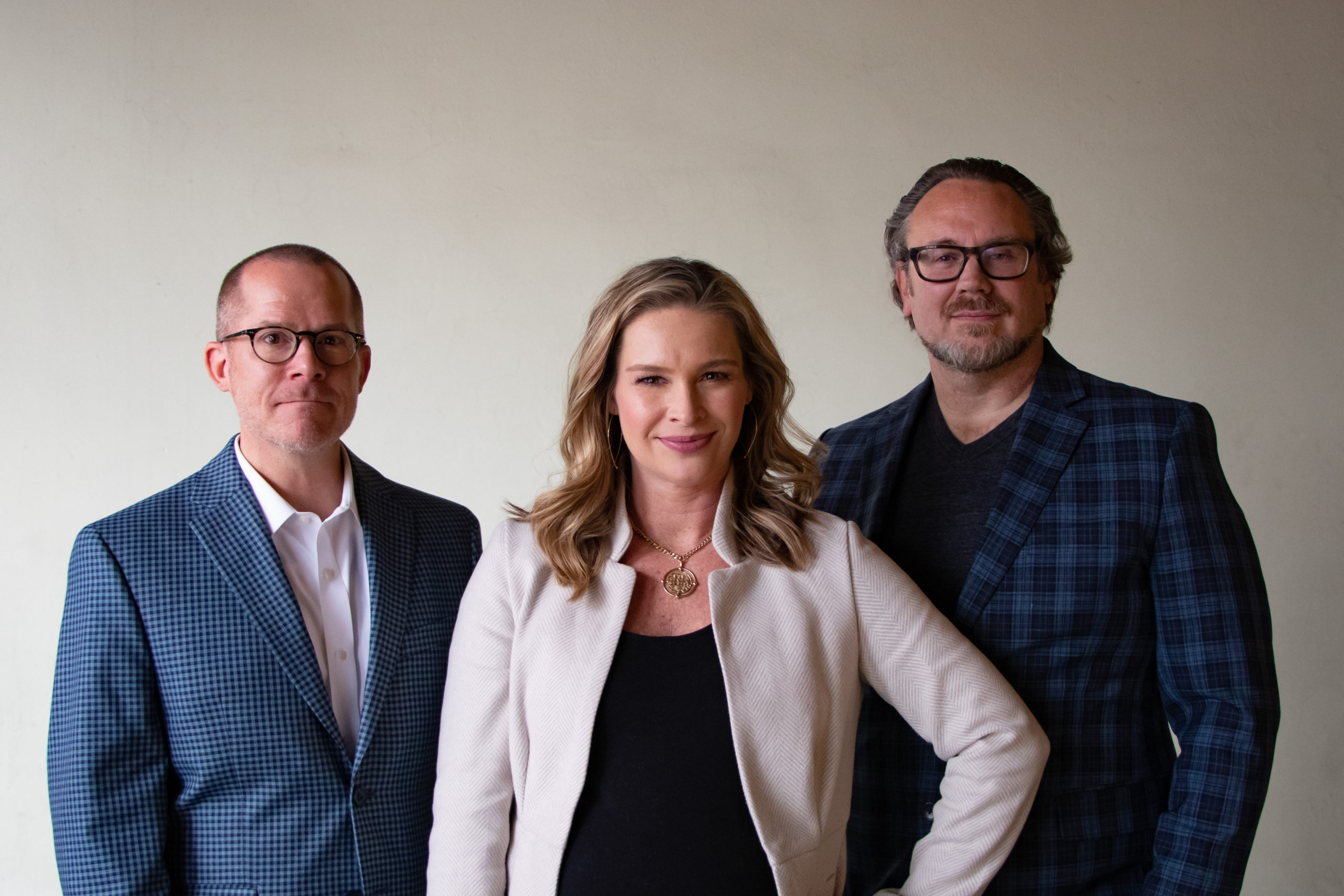 BCH Agency owners Matt Kamer, Allison Pitman and Brian Garr standing together