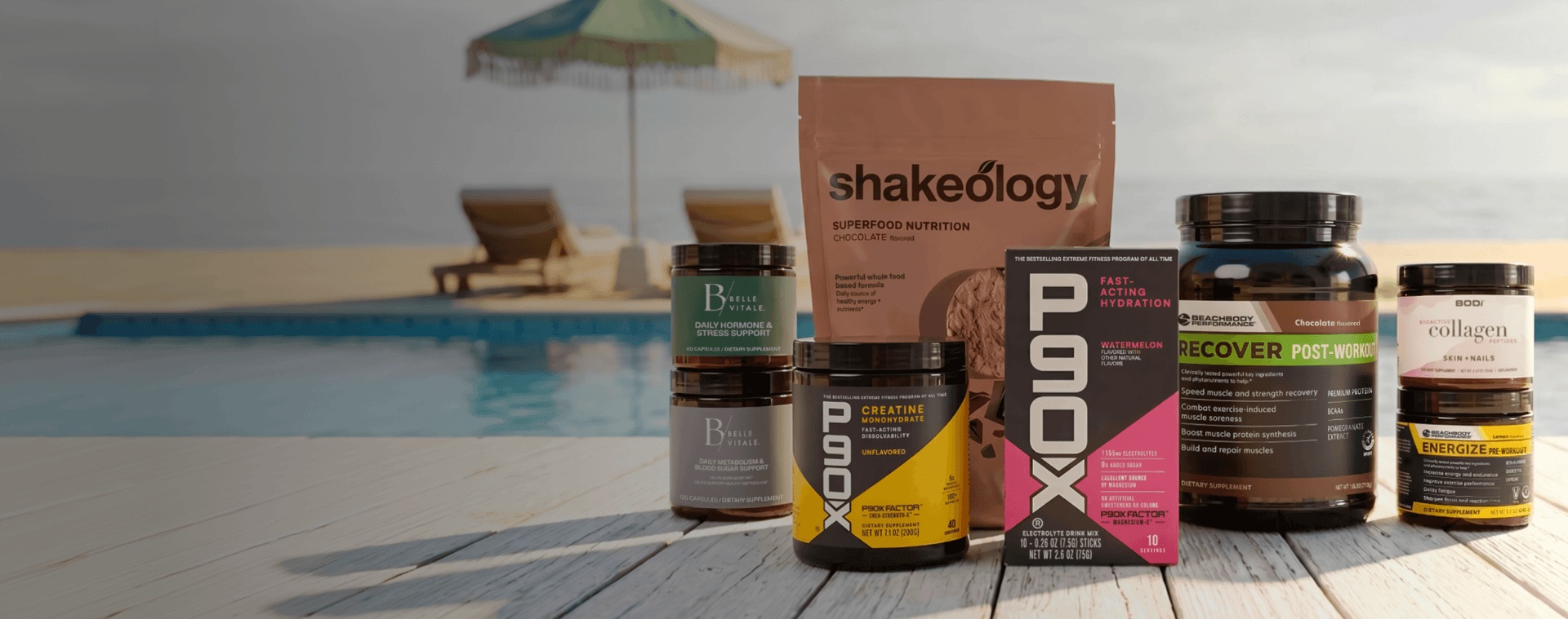 BODi nutrition products including Shakeology, P90X supplements and Beachbody Performance displayed beside a pool