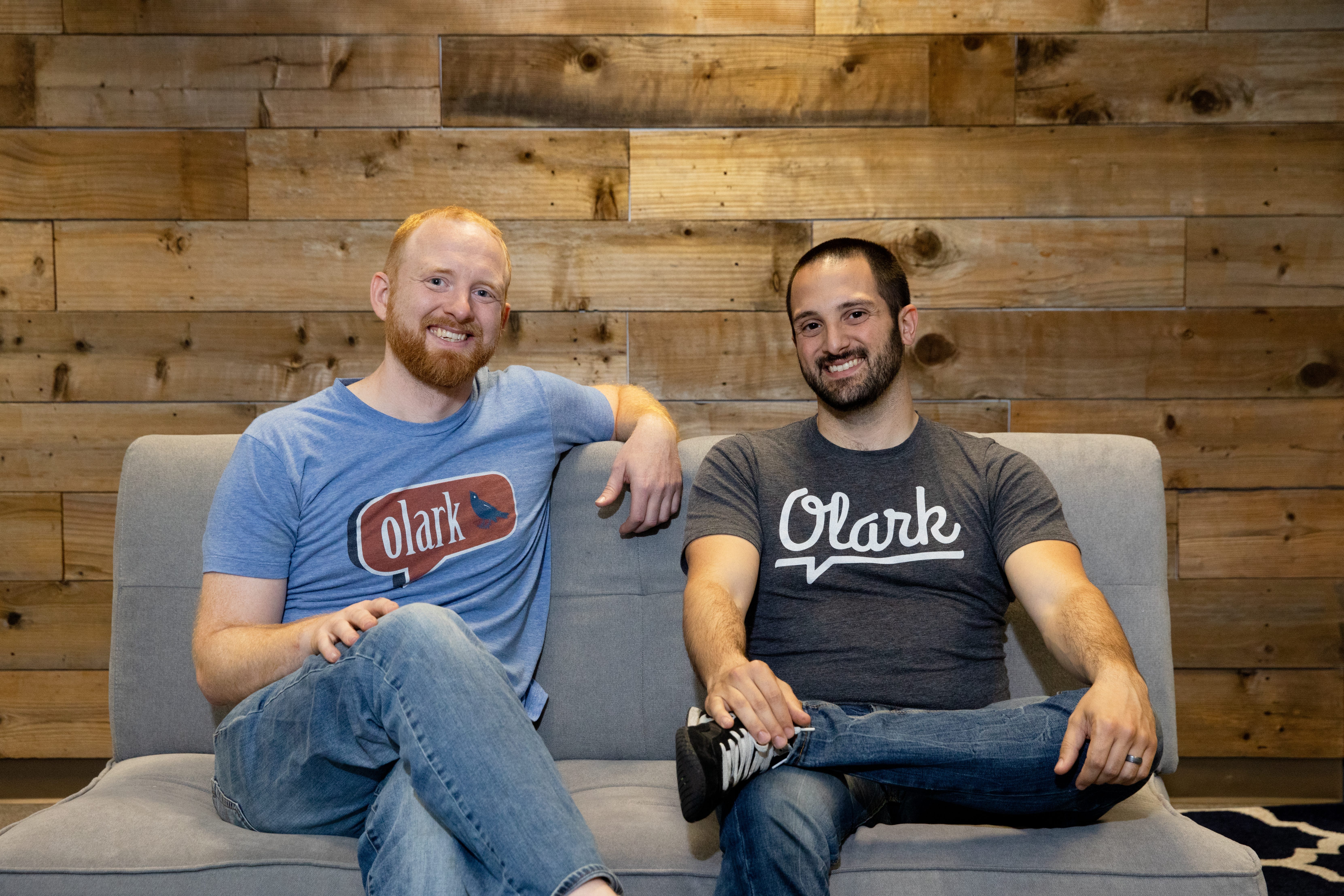 Ben Congleton and Matt Pizzimenti seated together wearing Olark shirts