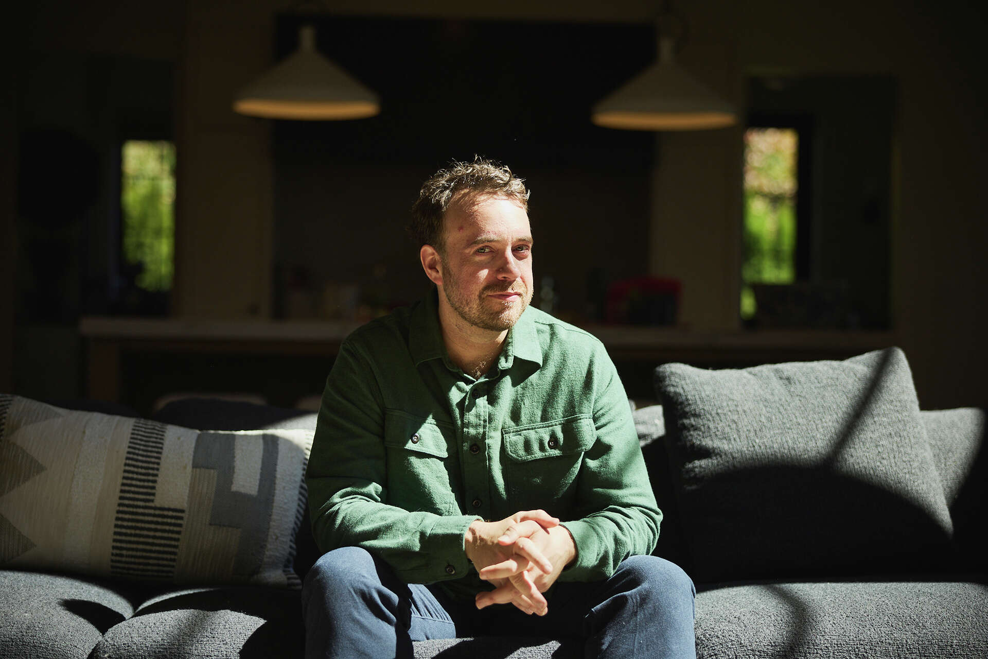 Ben Goodwin seated in a sunlit room at his Vancouver, Washington home