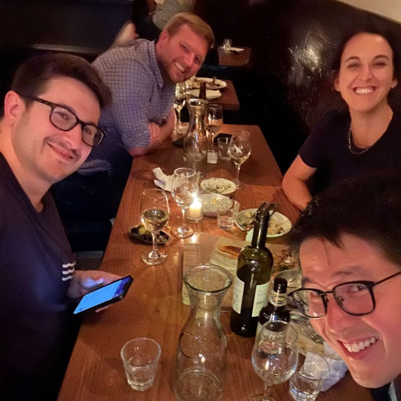 Ben Markowitz, Truett Dwyer, Gabriella Brignardello and TX Zhuo gathered around a restaurant table