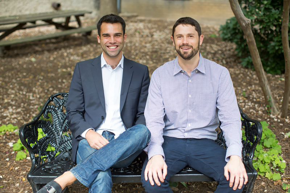 Fundrise co-founders Dan Miller, left, and Ben Miller, right, seated together on a park bench