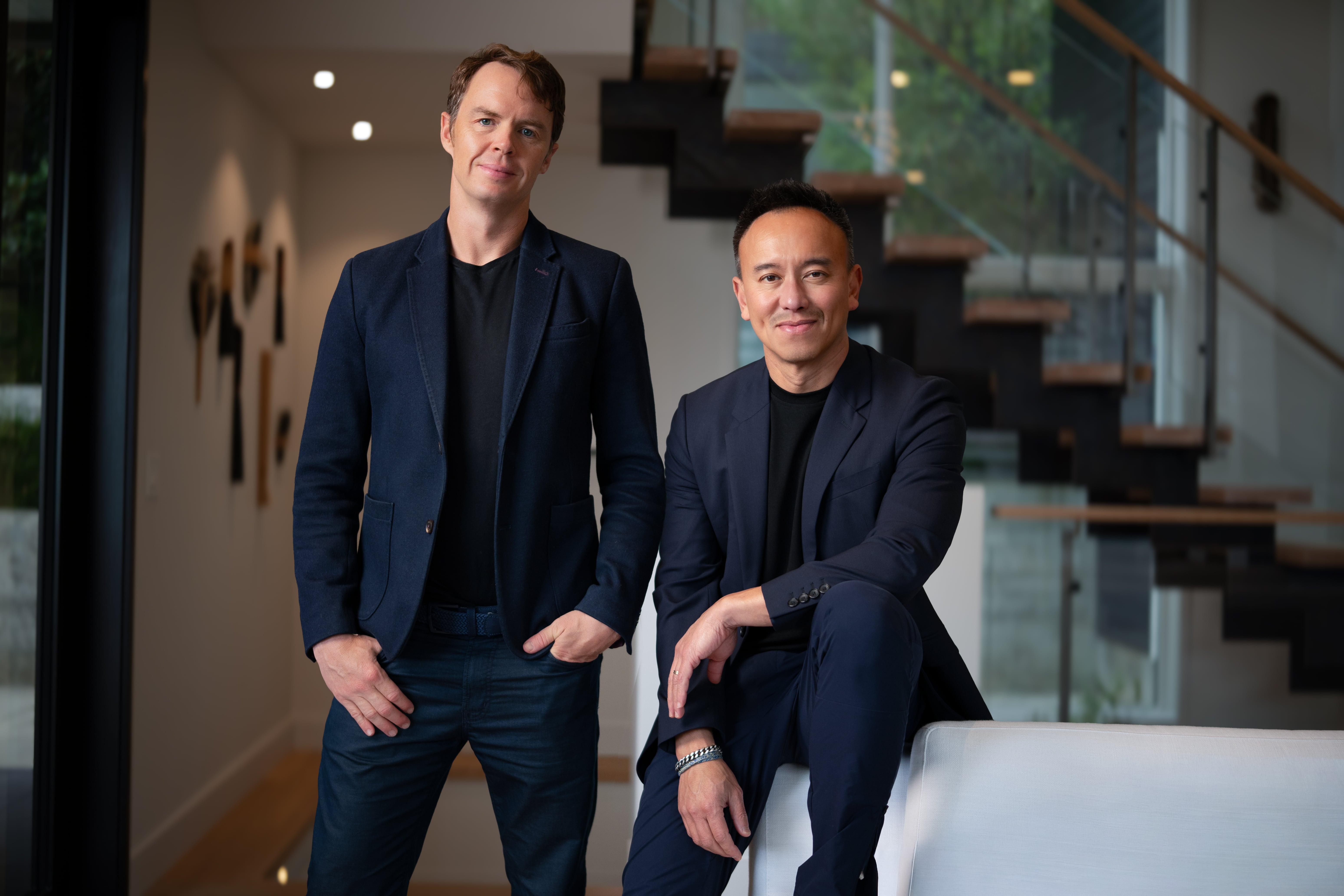 Obello co-founders Ollie Ralph, standing at left, and Ben Pham, seated at right