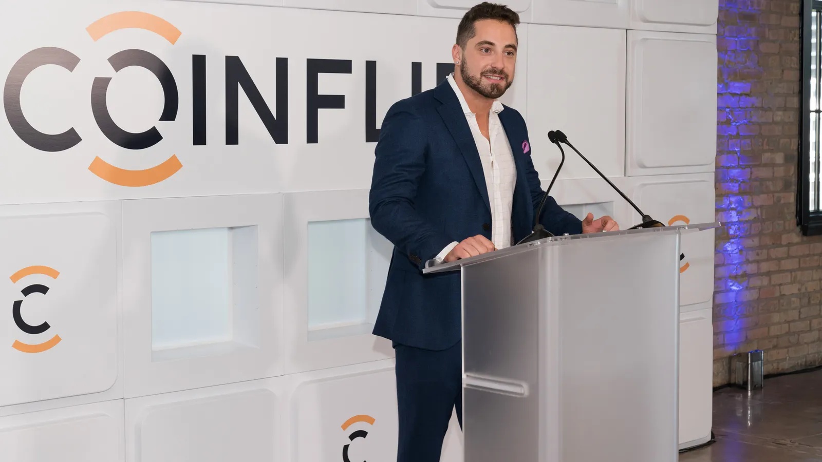 Ben Weiss speaking at the 2021 Illinois press conference announcing CoinFlip’s Chicago expansion