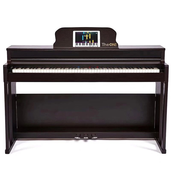 Archival The ONE digital piano with a tablet displaying a learning game