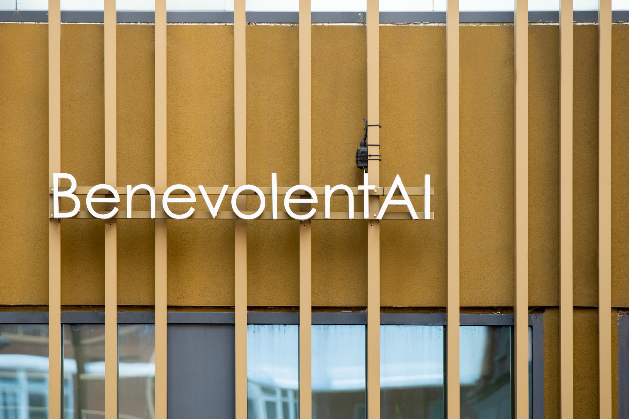 BenevolentAI lettering on the gold-colored exterior of its London office.