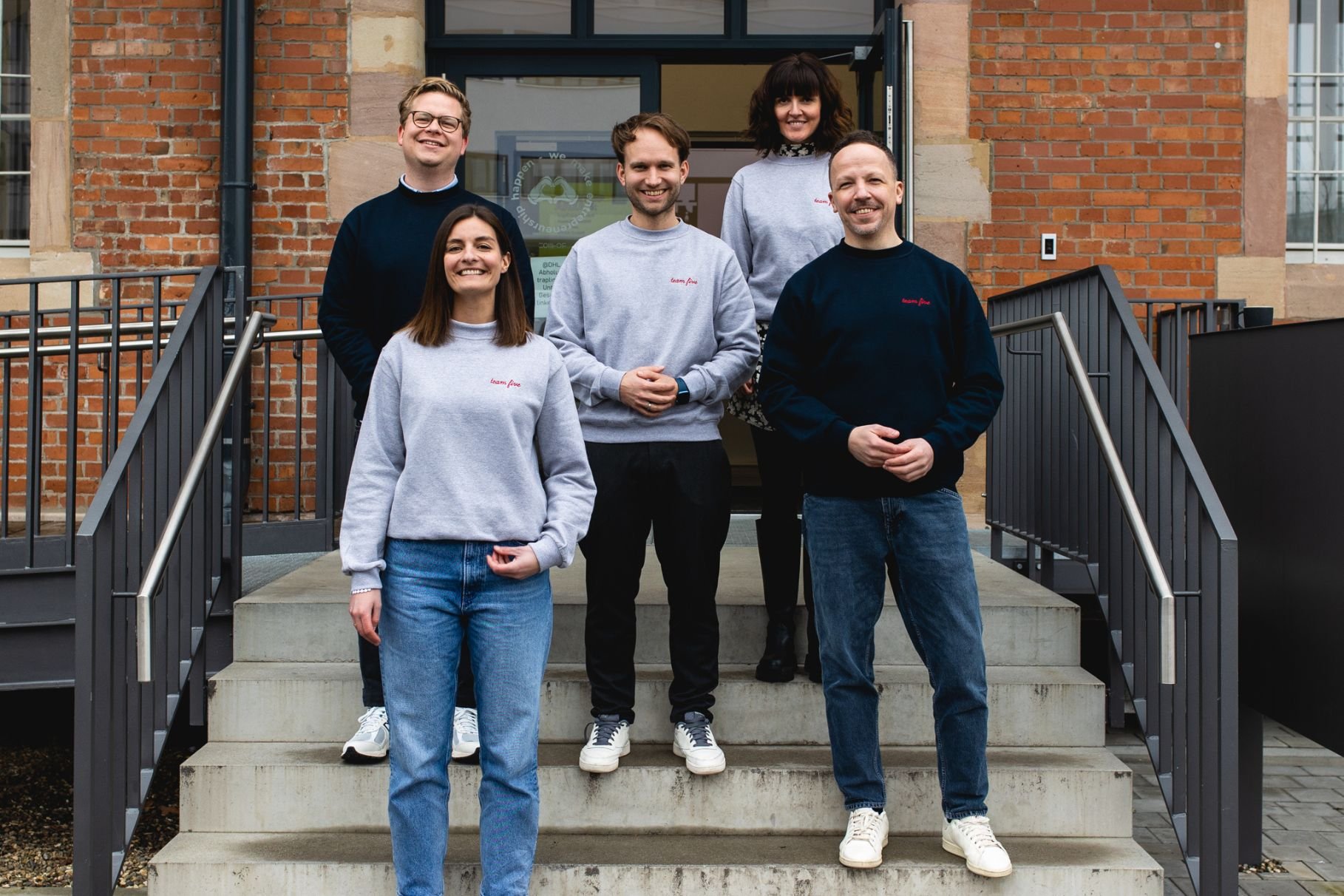 Benjamin Bauer, Carolin Hofmann, Michael Melcher, Martin Kassubek and Anne Christin Braun on the steps outside ZOLLHOF