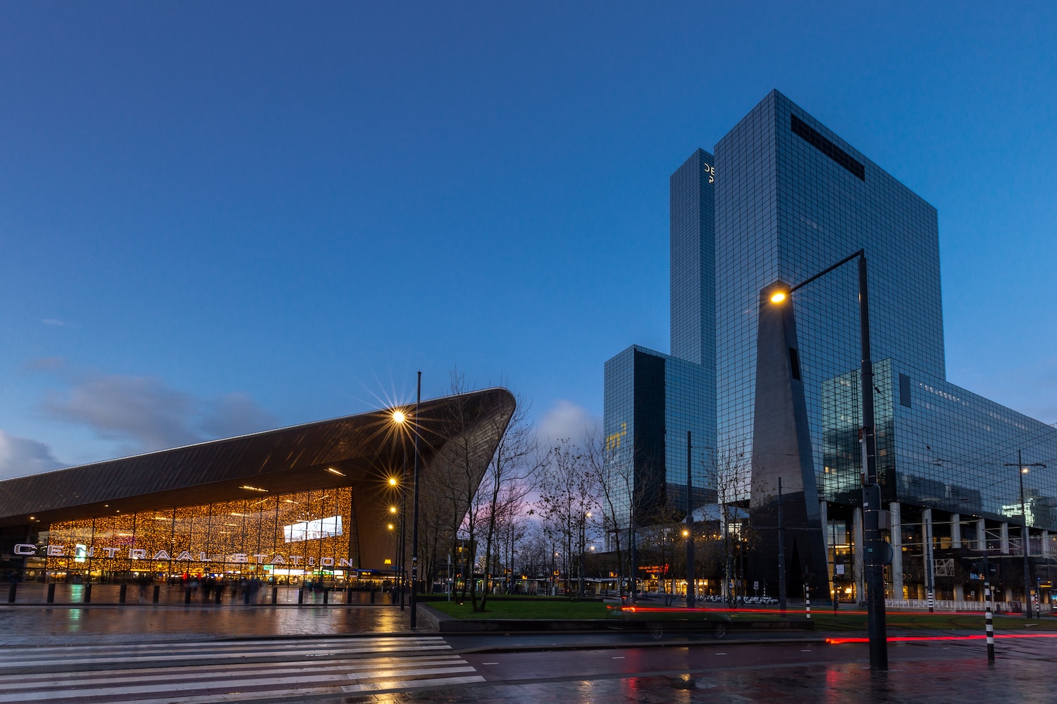 Rotterdam Centraal station and nearby office buildings at dusk