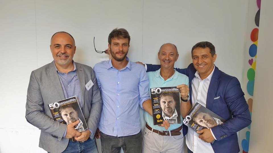 Benoit Buridant, second from left, with participants holding the Grand Sud Network magazine at its 2018 New York launch