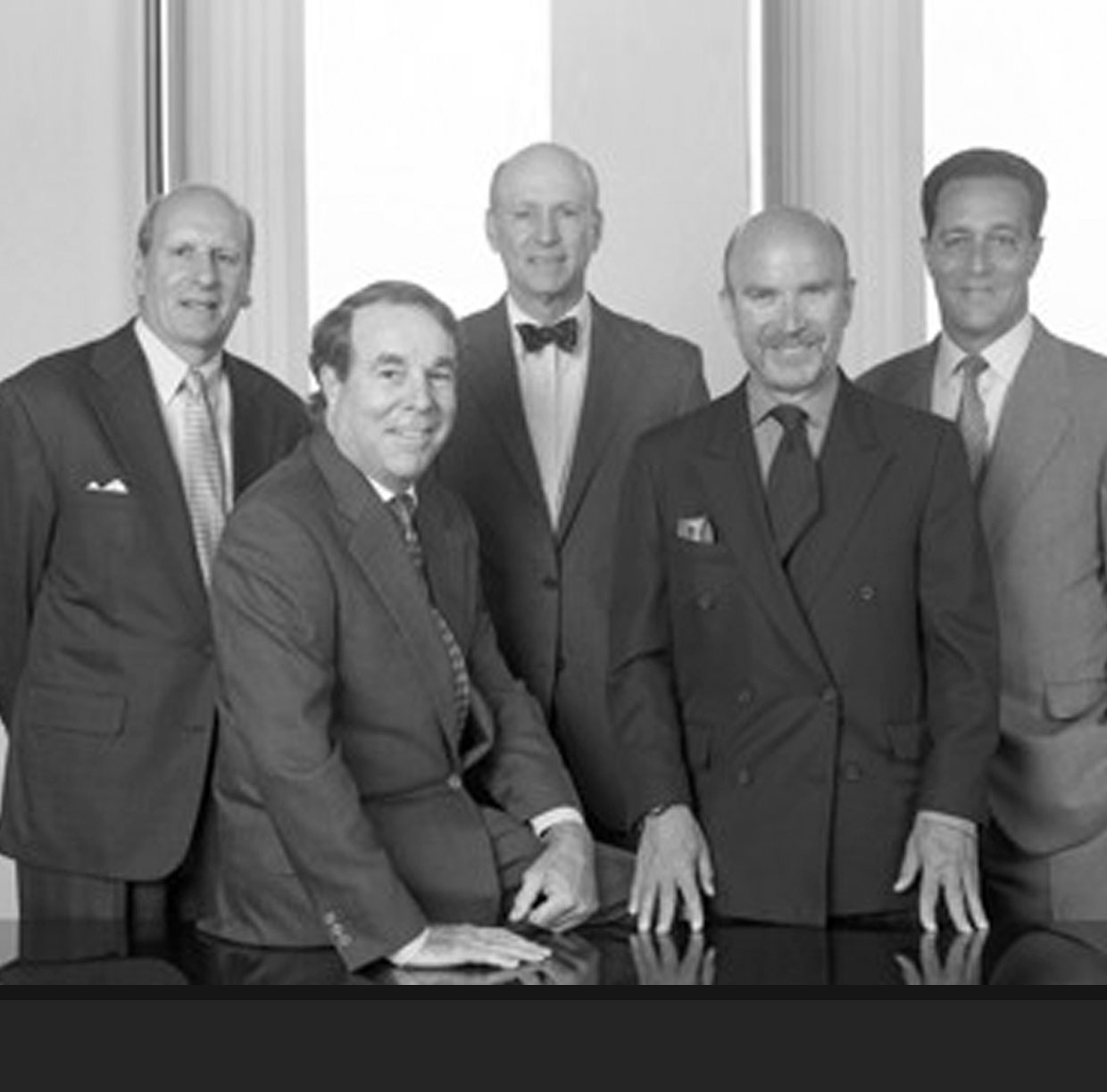 Archival black-and-white group portrait from Berkshire Partners’ founding-era history