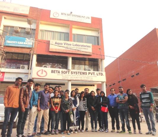 University students and faculty standing outside the Beta Soft Systems Pvt. Ltd. office in Panchkula during a February 2016 visit