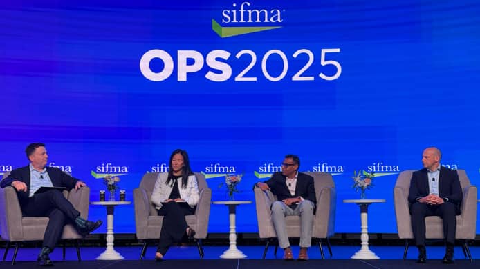 Four panelists seated onstage at the SIFMA OPS 2025 conference