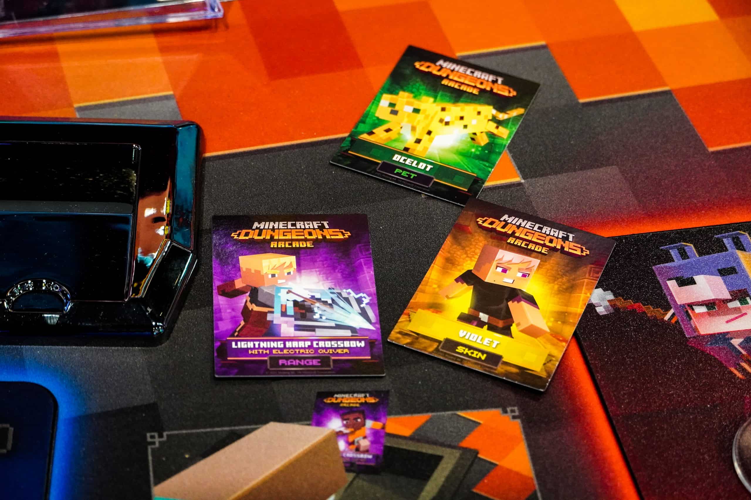 Close-up of Minecraft-themed redemption cards and prizes