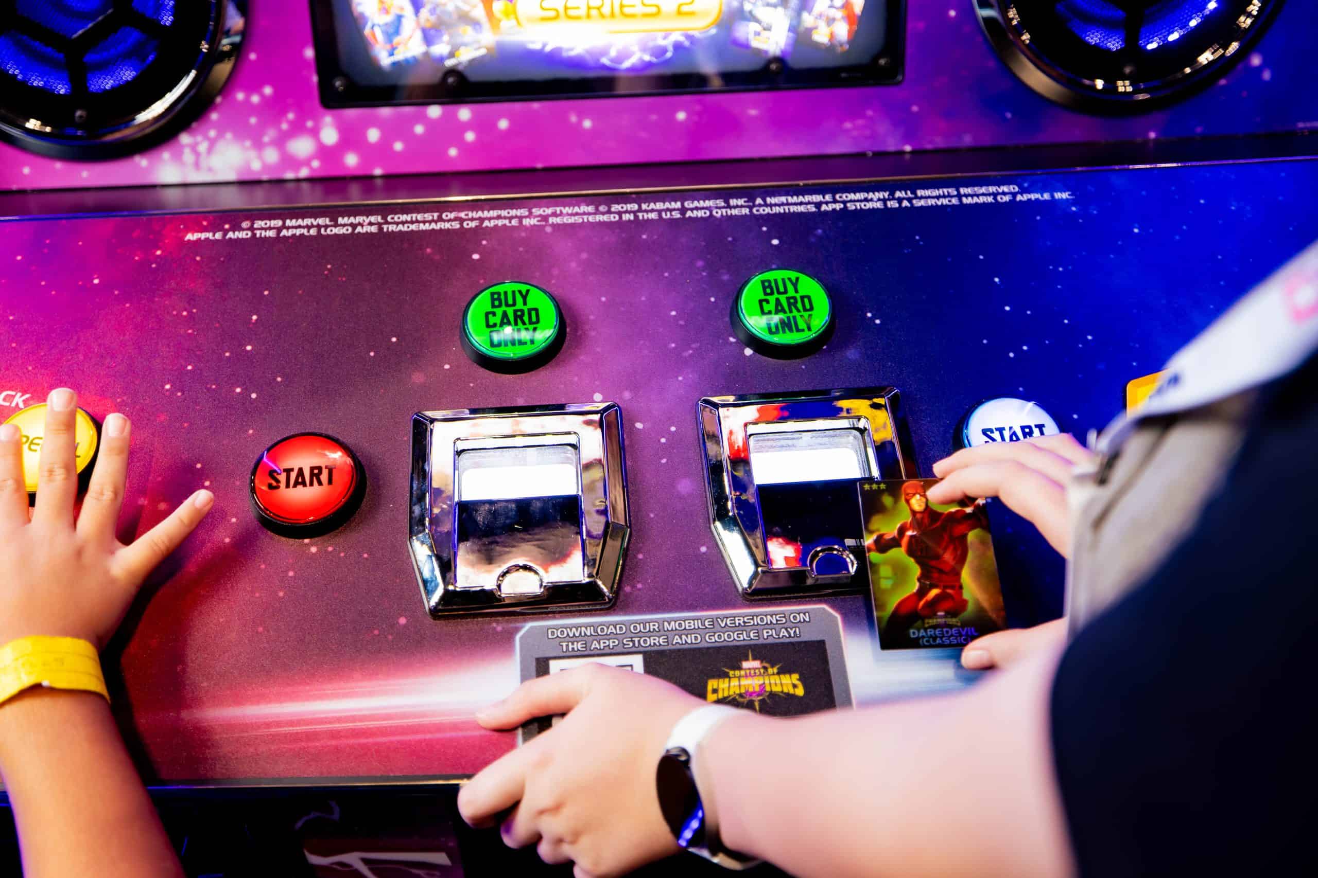 Betson booth of arcade machines at a trade show