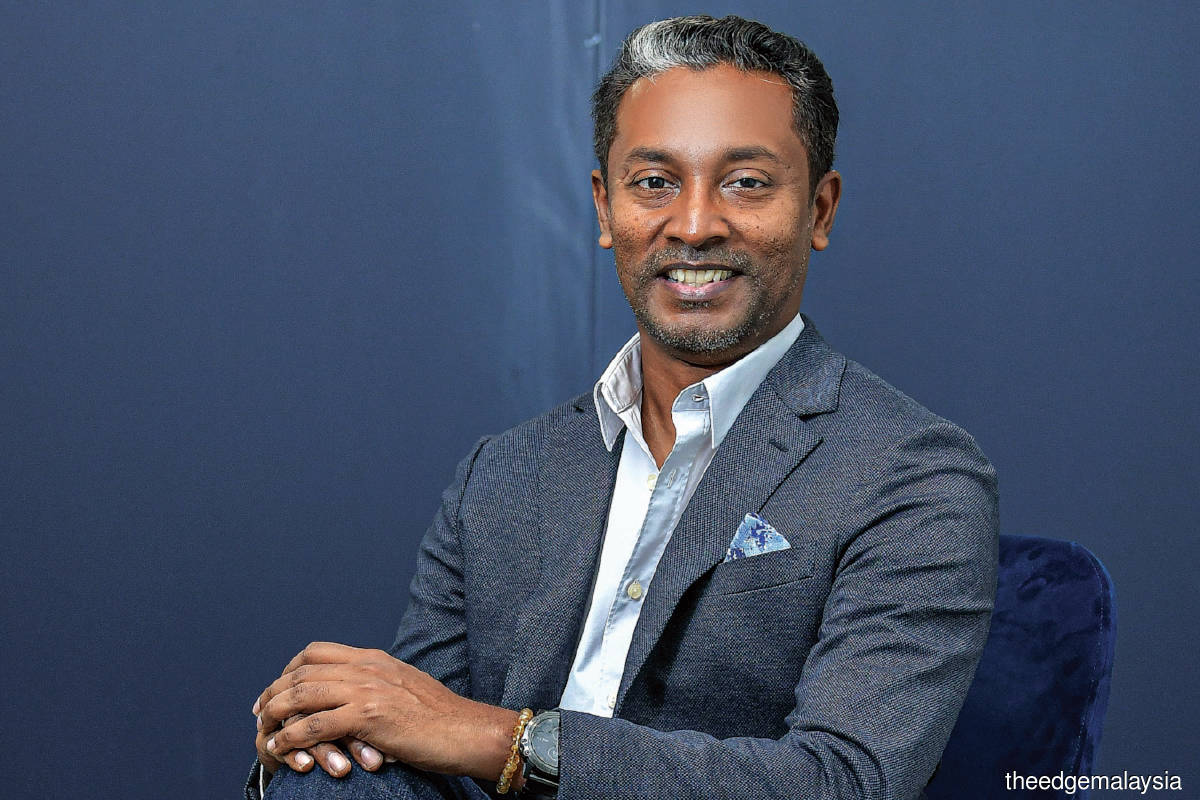 BEYOND4 founder and CEO S.T. Rubaneswaran seated for a portrait