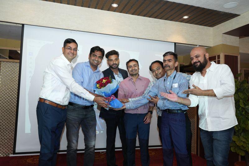 Spanidea colleagues presenting a bouquet during the company’s thirteenth-anniversary celebration in Jodhpur