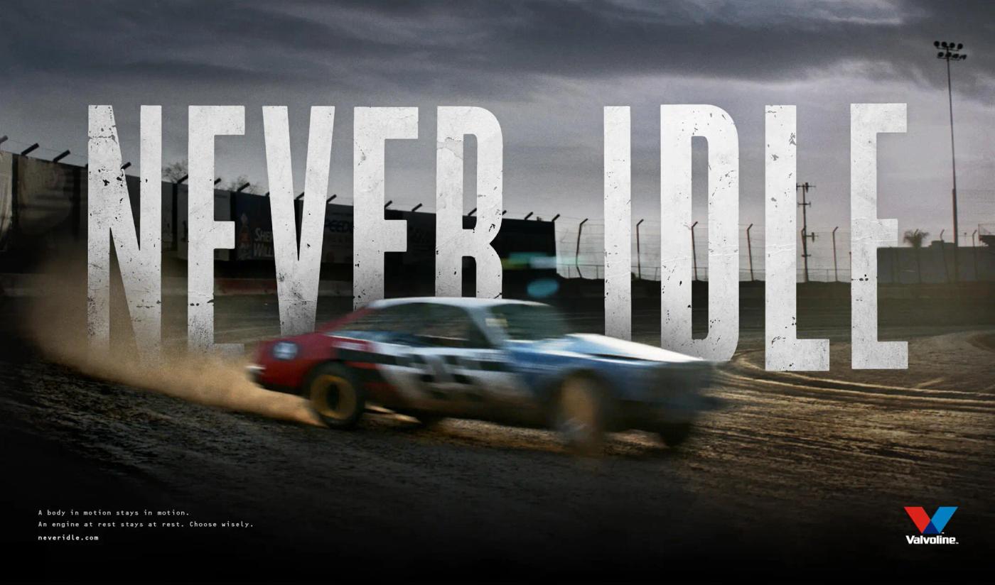 Valvoline 'Never Idle' campaign key art with a dirt-track stock car