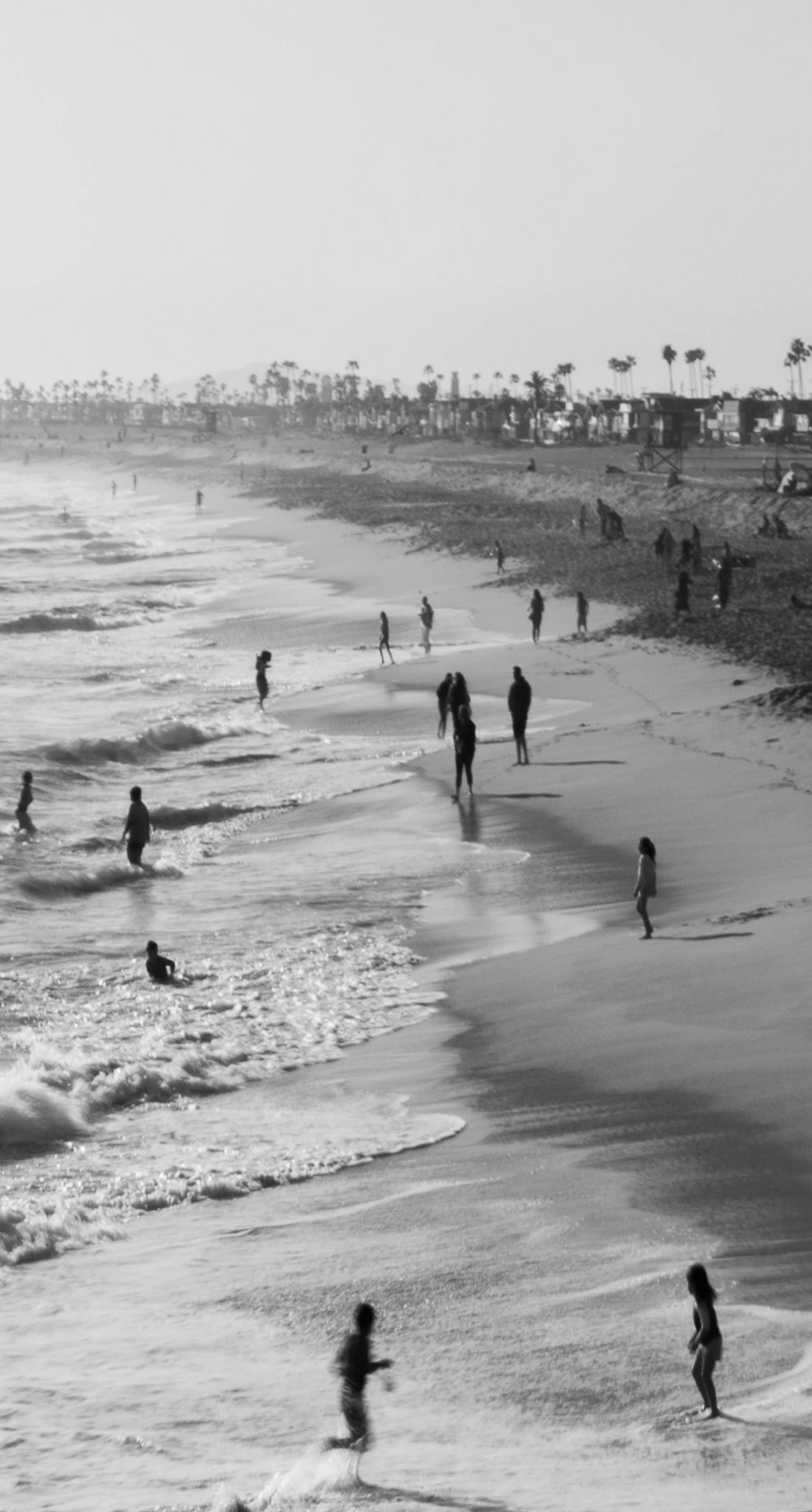 A black and white view of an Orange County beach, published on Big Hype Marketing's about page