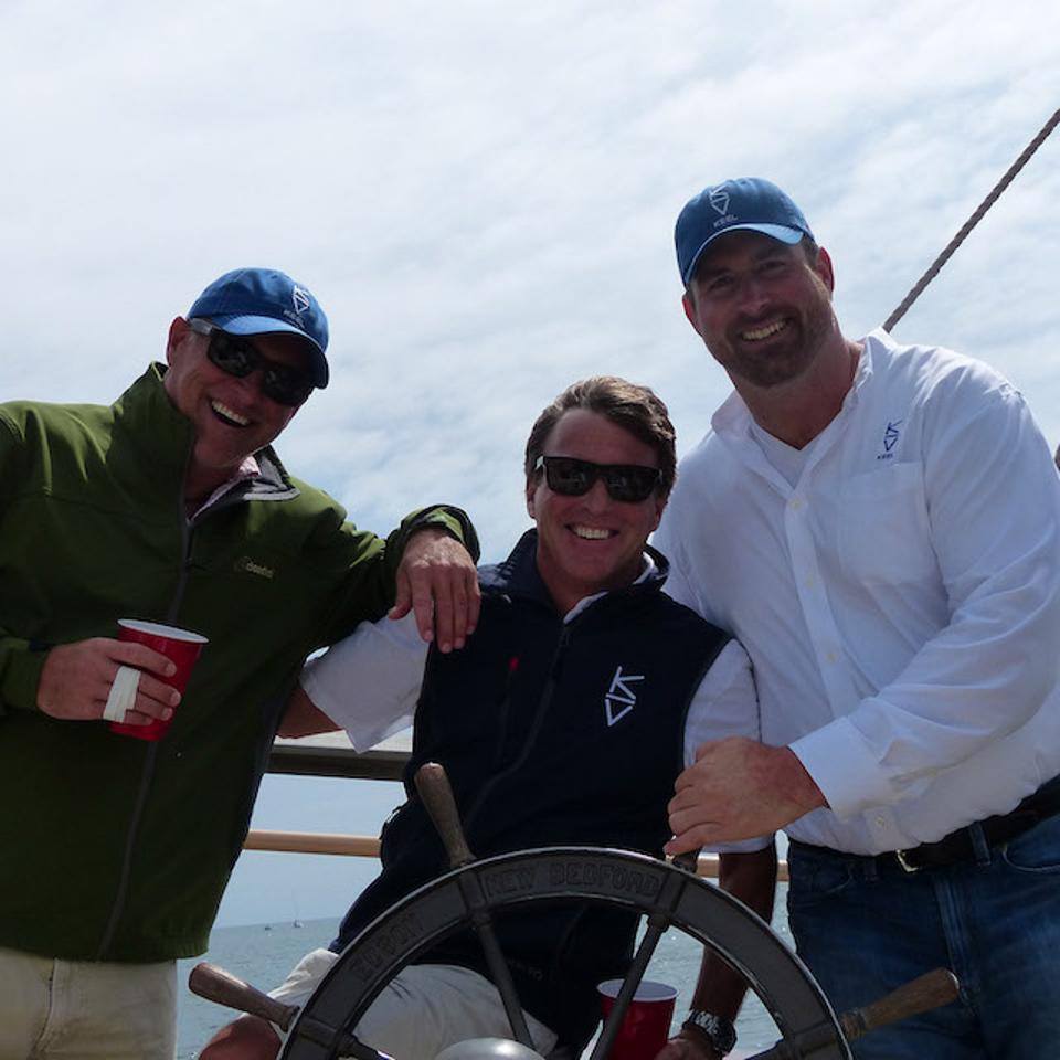 Bill Dessel, Tom McGowan and Matt Light together on a boat