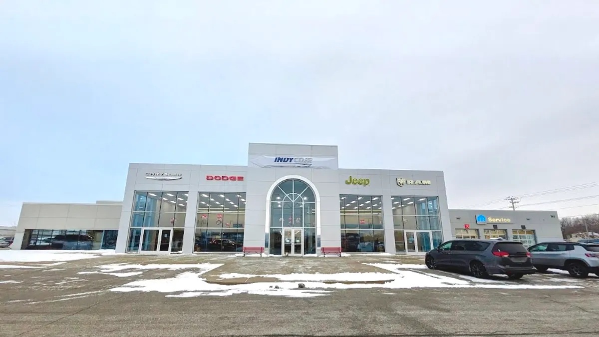 The former Bill Estes Chrysler Dodge Jeep Ram dealership, renamed Indy CDJR, with vehicles parked outside