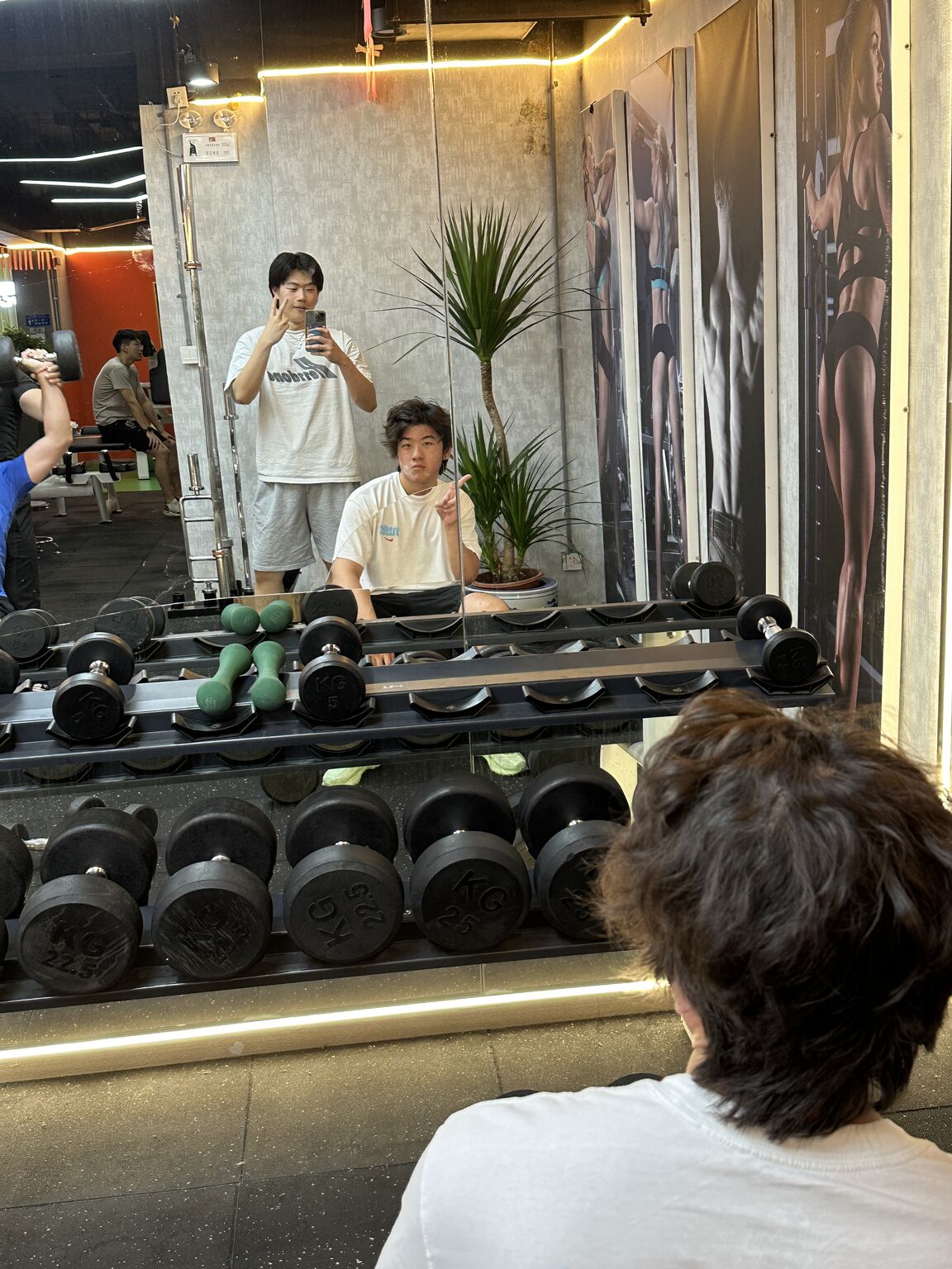 Bill Jiao and Guanming Wang together in the Beijing gym where they first met