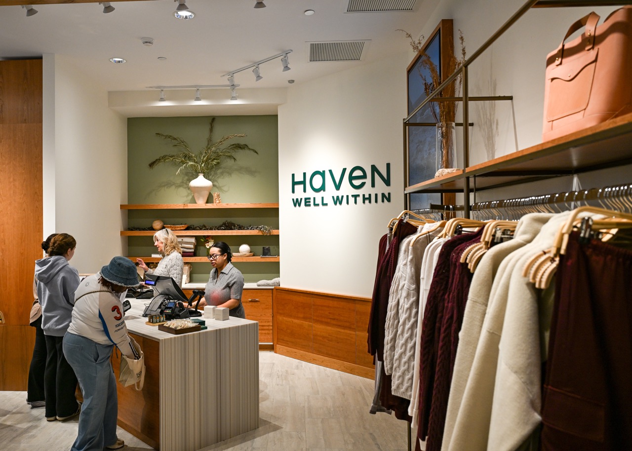 Guests and associates inside Haven Well Within's first permanent retail store at Roosevelt Field Mall