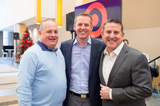 Bill Smith, center, with Target executives John Mulligan, left, and Brian Cornell, right, in 2017
