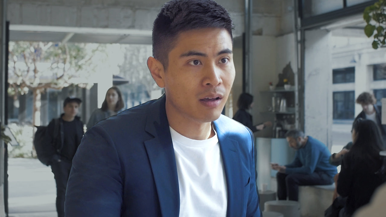 Bing Chen speaking during his 2020 Sene interview, wearing a blue jacket