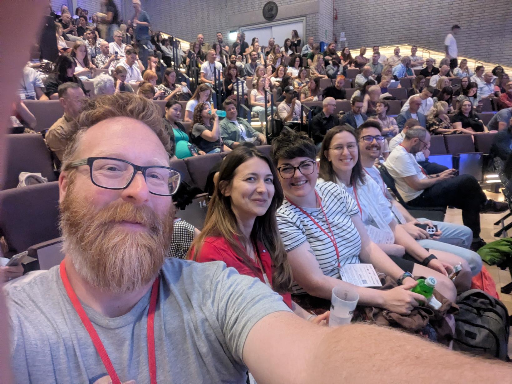 Group selfie in an auditorium from Bionical’s culture gallery