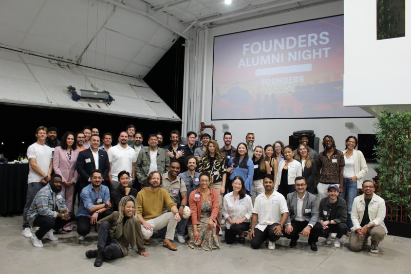 FoundersBoost alumni gathered for a group photograph in the UP.Labs hangar