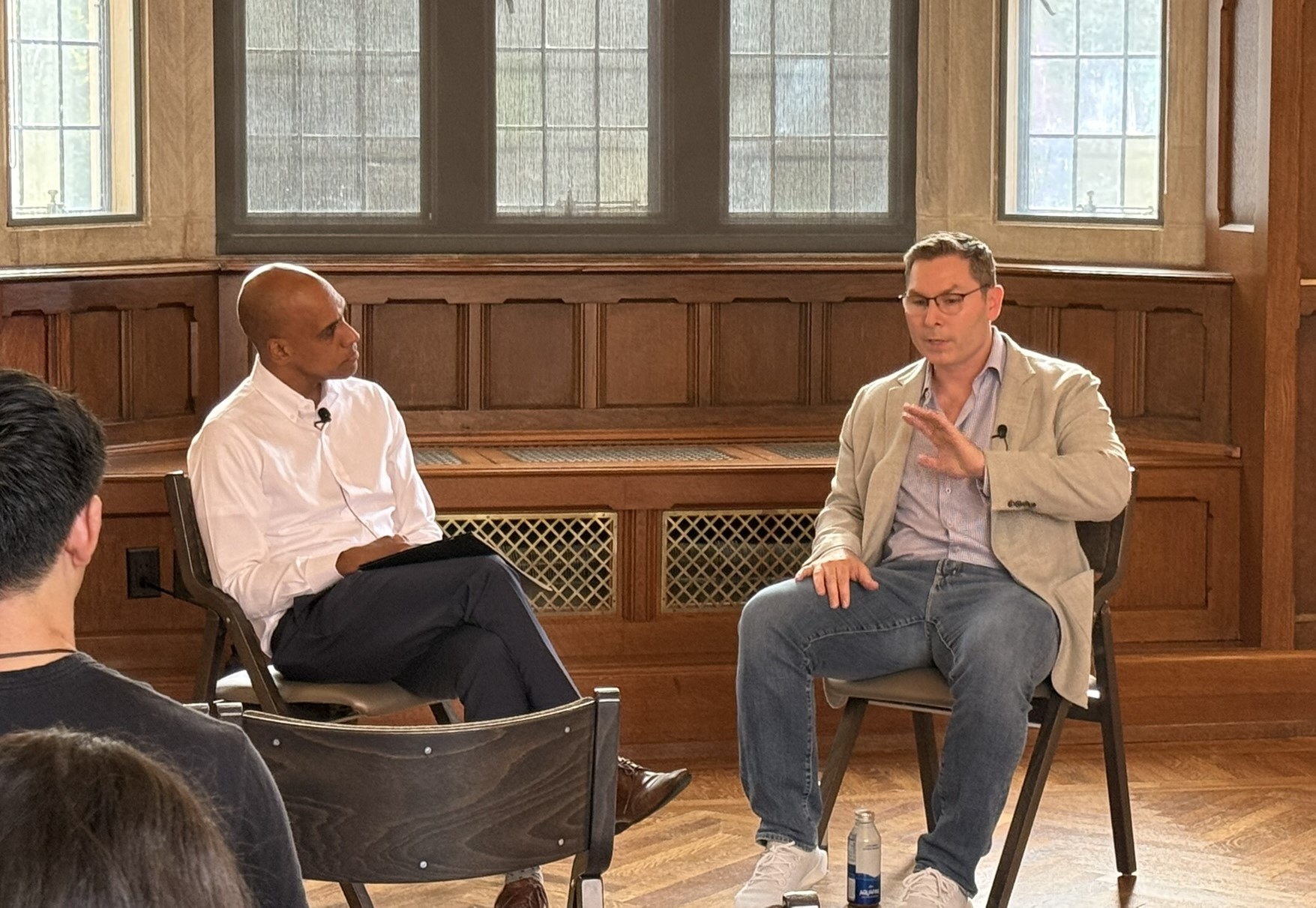 Blake Hall, right, speaking with Vanderbilt dean Matthew Johnson-Roberson