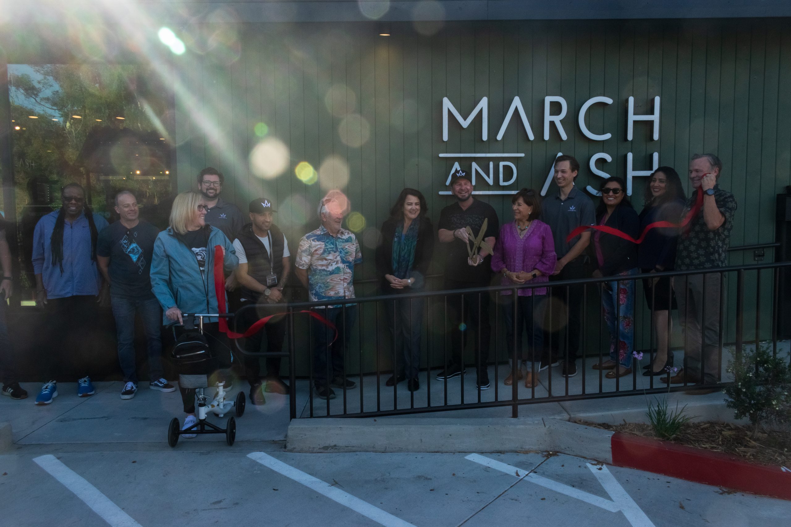 Blake Marchand and community members at a March and Ash ribbon cutting in Chula Vista