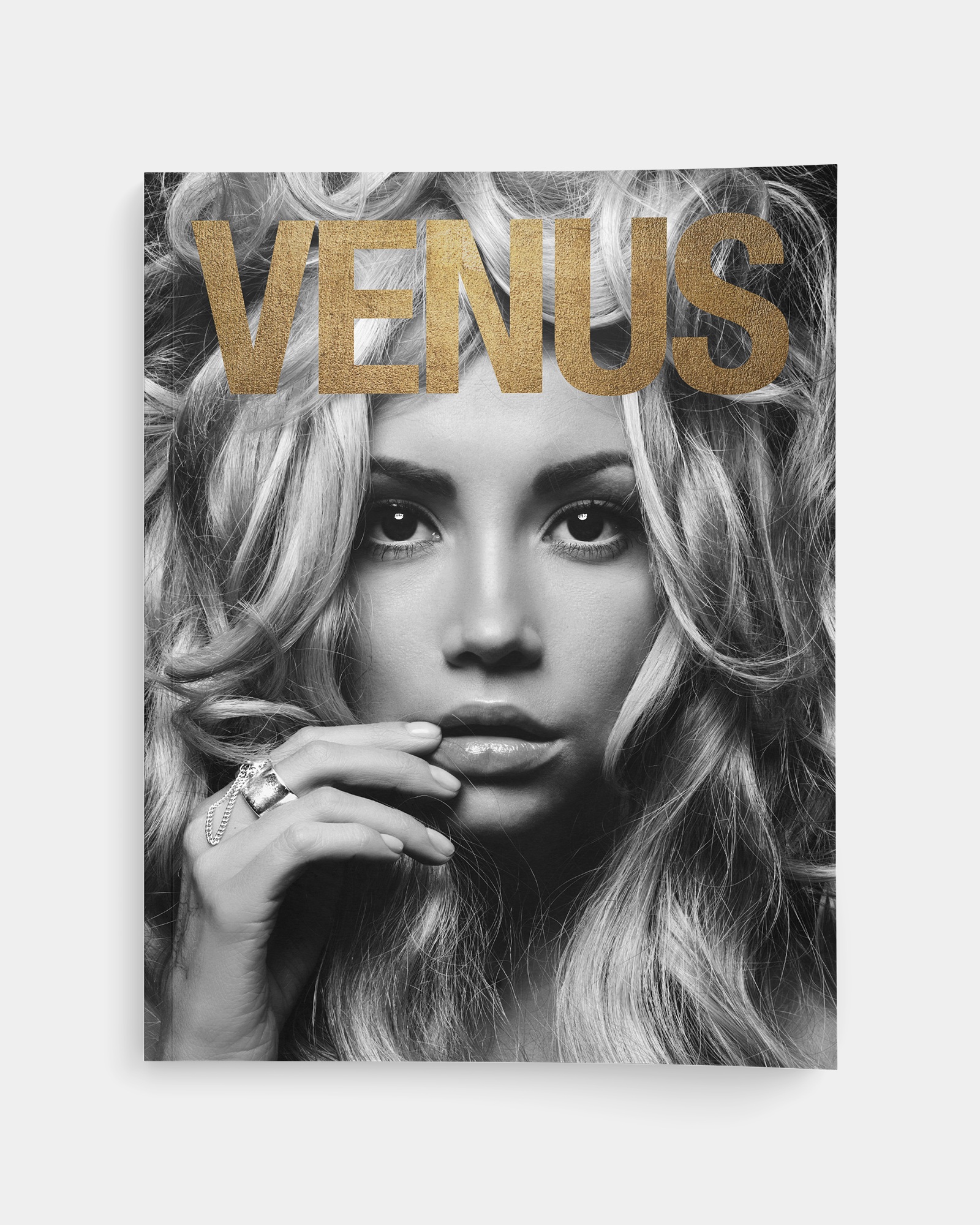 Venus promotional cover mockup with gold lettering over a black-and-white beauty photograph