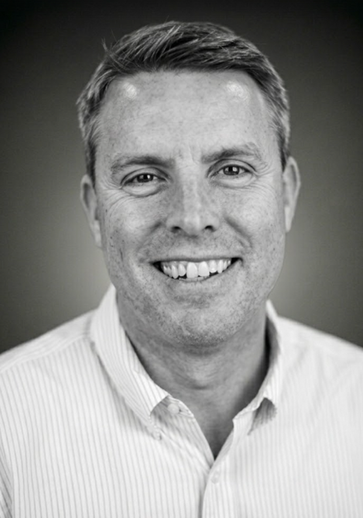 Black-and-white portrait of Boathouse co-founder John Connors