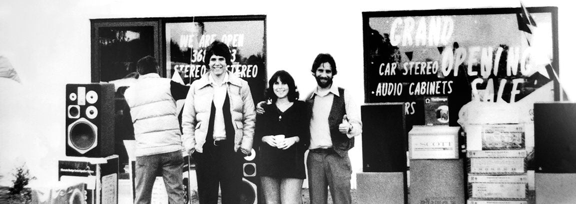 Ron, Karen, and Bob outside World Wide Stereo on opening day in 1979