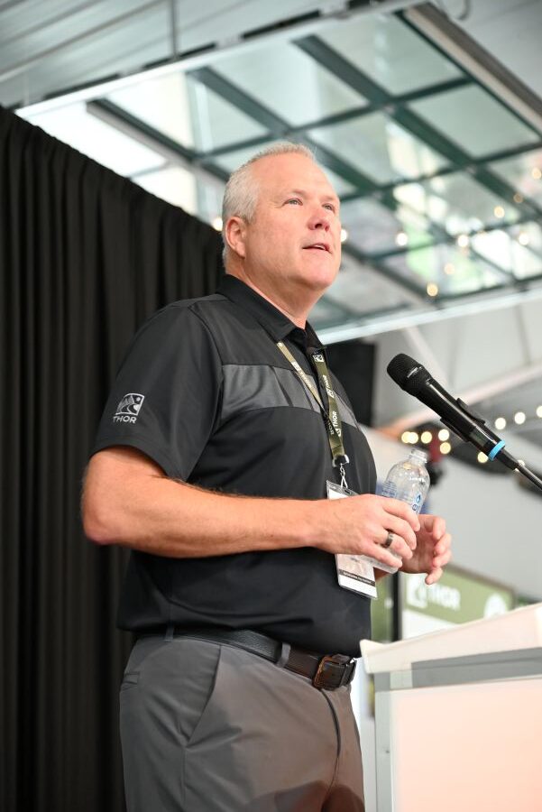 Bob Martin speaking into a microphone at THOR's 2025 Open House kickoff