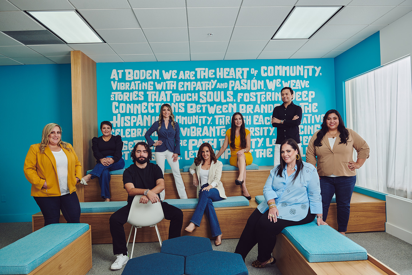 BODEN Agency leadership team standing together in a bright studio