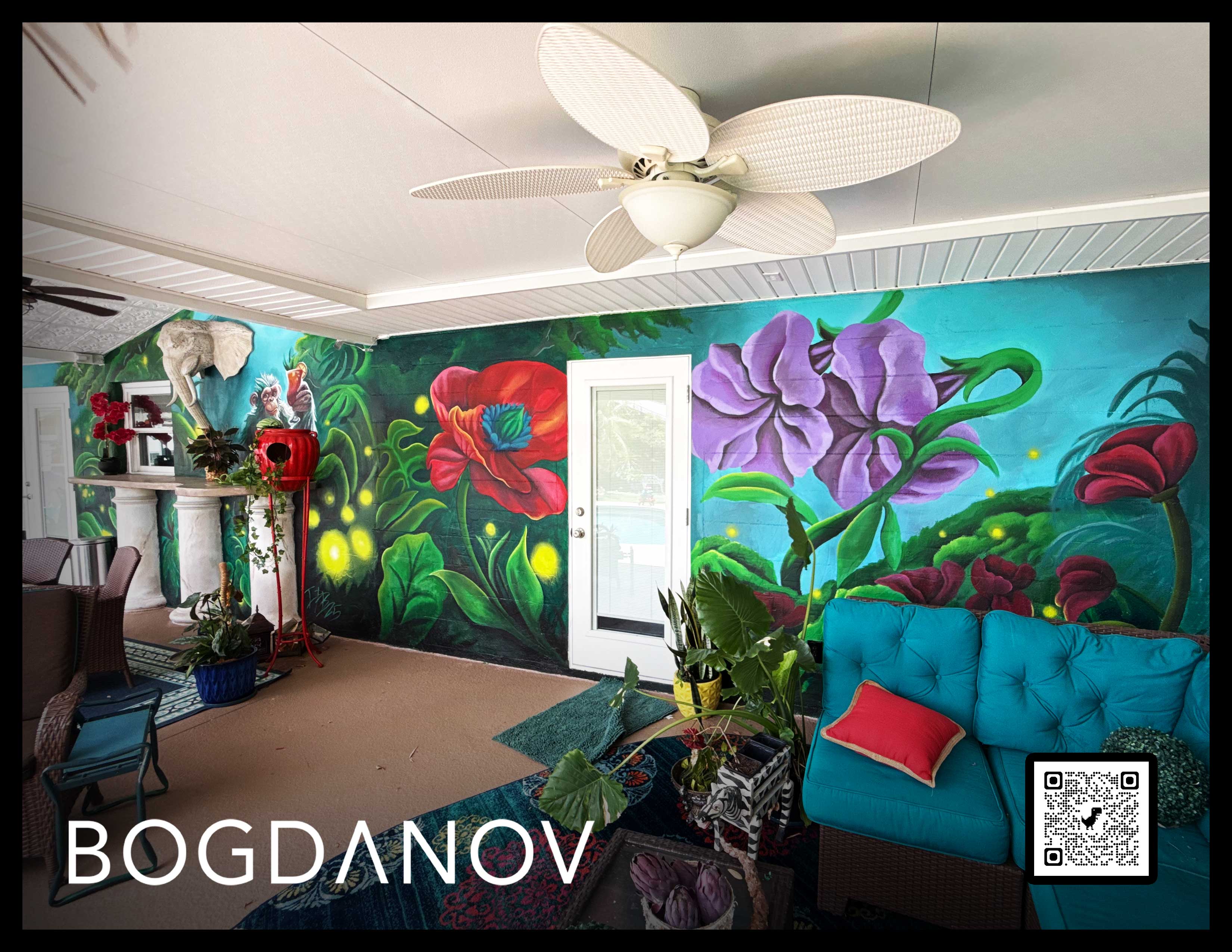 Completed tropical mural surrounding a Florida patio, with oversized flowers, foliage and a cocktail-holding monkey