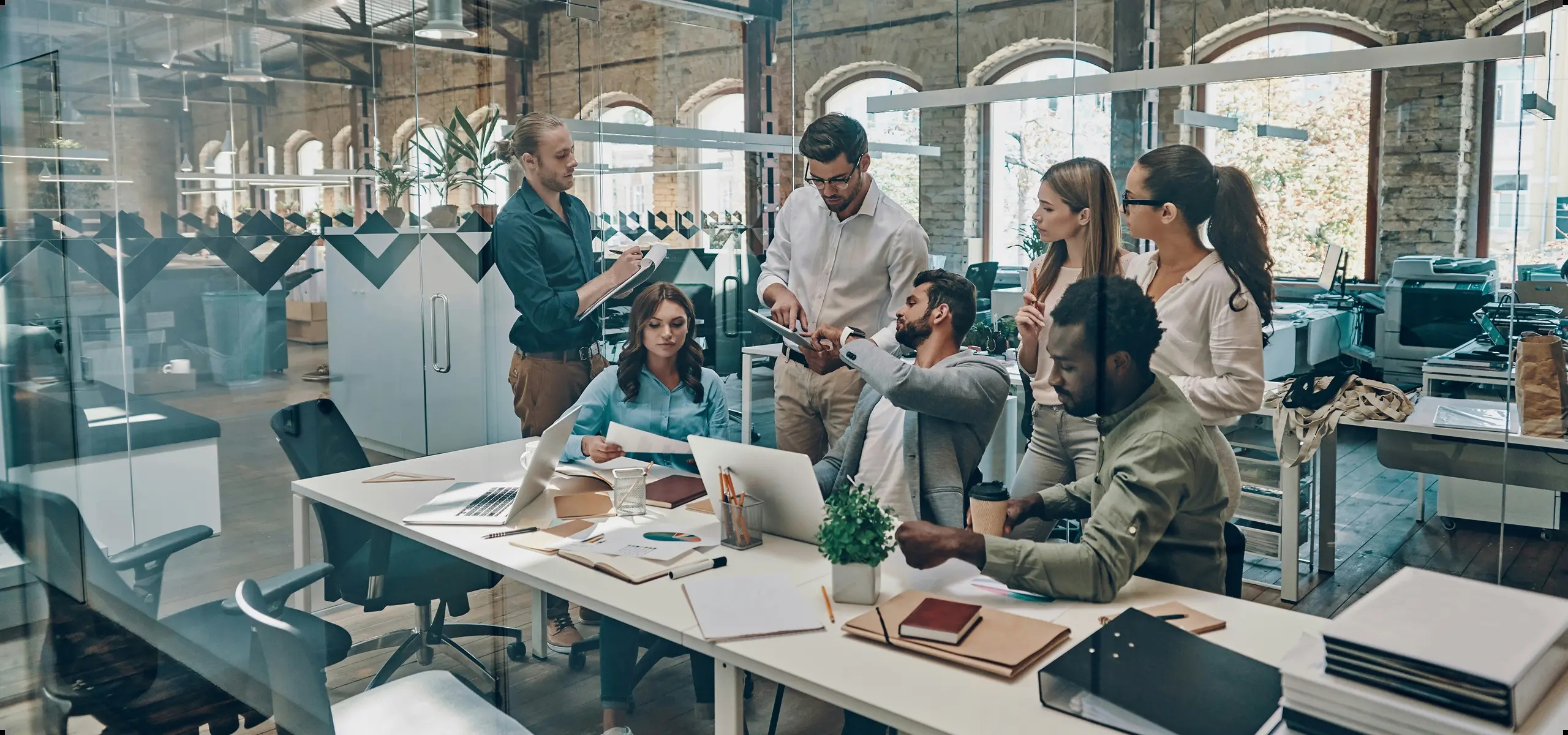 An illustrative office collaboration scene used on Boku’s company website