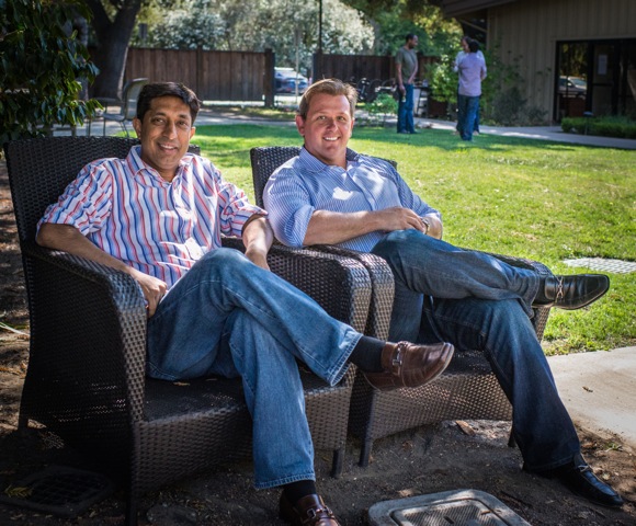 Mukul Agarwal and Marco ten Vaanholt seated outdoors in 2014